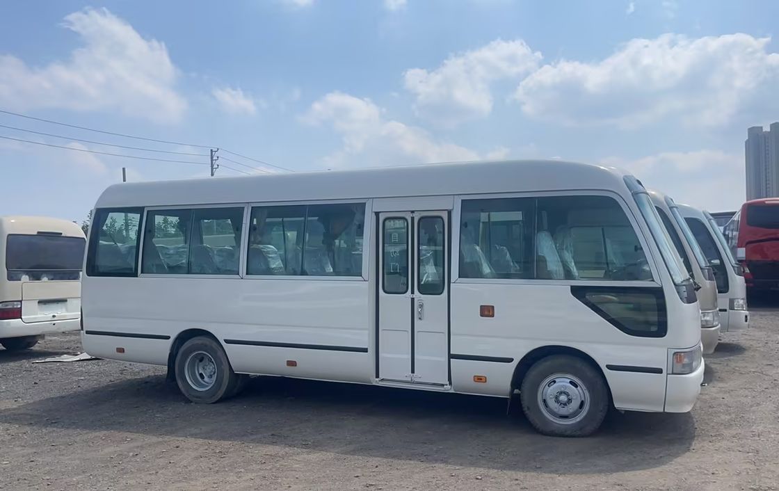7m 30 Sitz Toyo Ta Coaster Bus Motor Kapazität 4L Gesamtmaße mm 7725x2000x2600