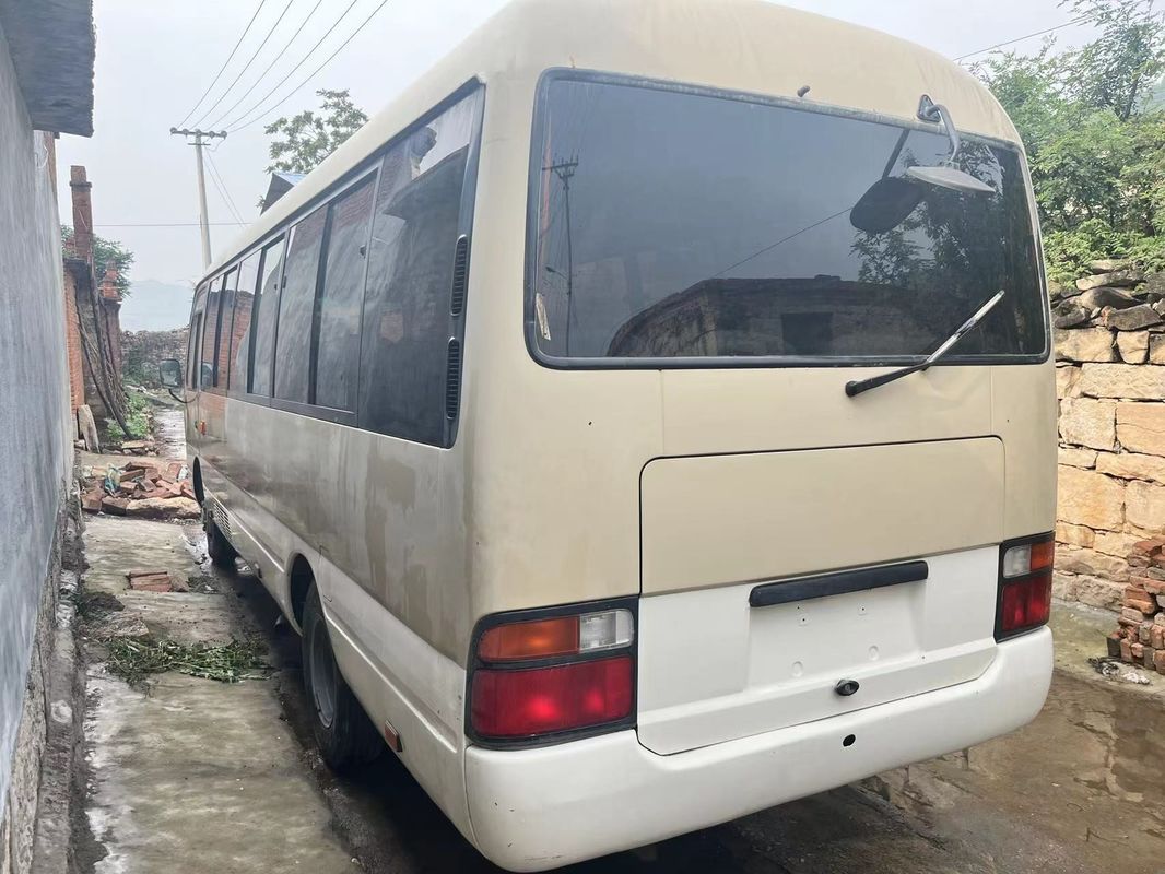 Motorkapazität 4L Toyota Coaster 30 Sitzplätze Linkslenker LHD Gebrauchtbusse für Touristen