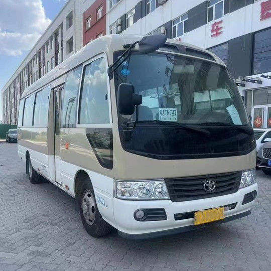 2023 Modell Benzin Toyota Coaster Bus 30 Sitzplätze Motorkapazität 4L 7005*2040*2785mm