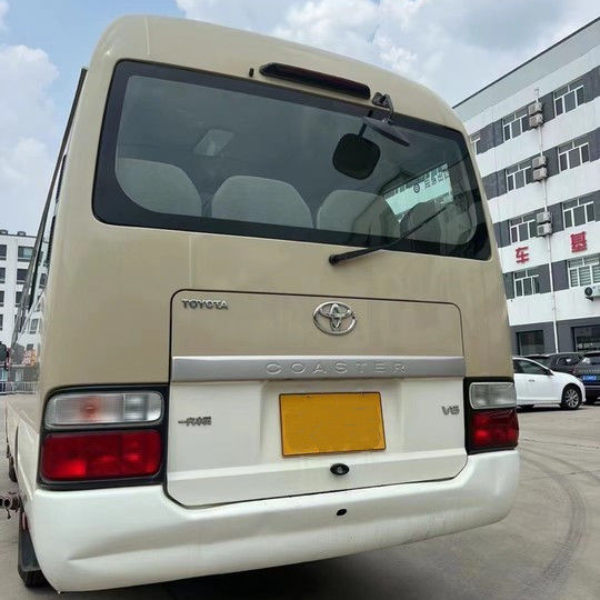 2023 Modell Benzin Toyota Coaster Bus 30 Sitzplätze Motorkapazität 4L 7005*2040*2785mm