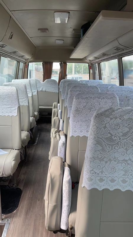 Handgetriebe 7m LHD Second-Hand Passagier Minibus 30 Sitzplätze Coaster Gebrauchtbus